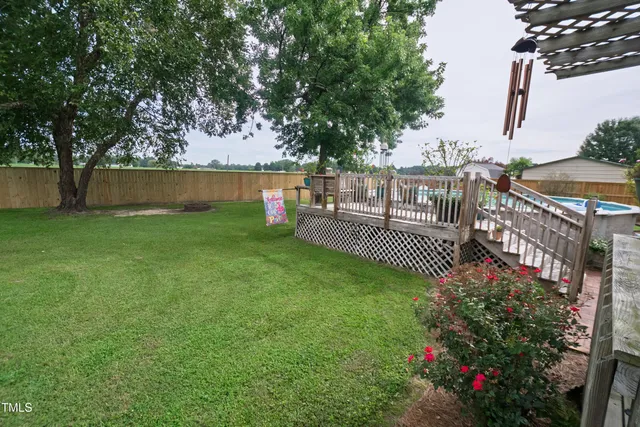 a view of a deck and a garden