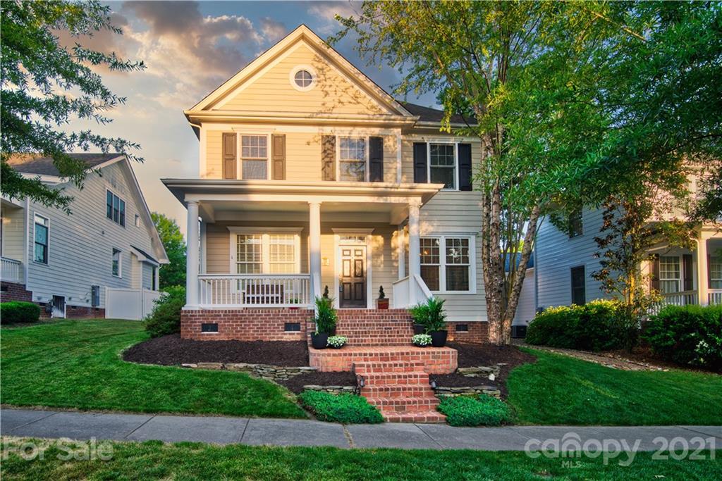 700 Revival Row Fort Mill, SC 29708 - Photo 1 of 44 a front view of a house with a yard