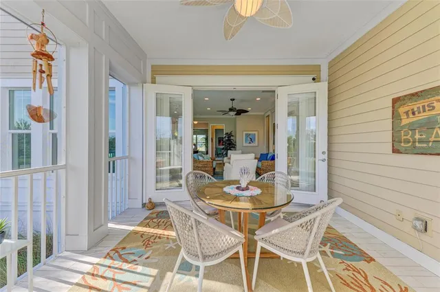 a bathroom with a granite countertop sink a large mirror and a shower