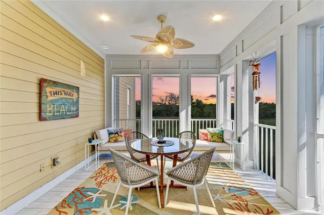 a bedroom with a bed a dresser and a book shelf