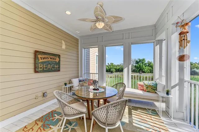 a bathroom with a sink vanity mirror and toilet