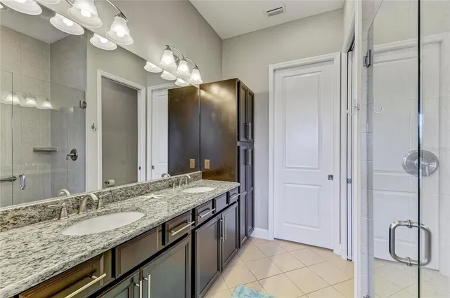a living room with fireplace furniture and a wooden floor