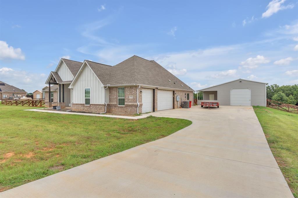 7609 Carter Ranch Road Azle, TX 76020 - Photo 4 of 38 Extra wide driveway
