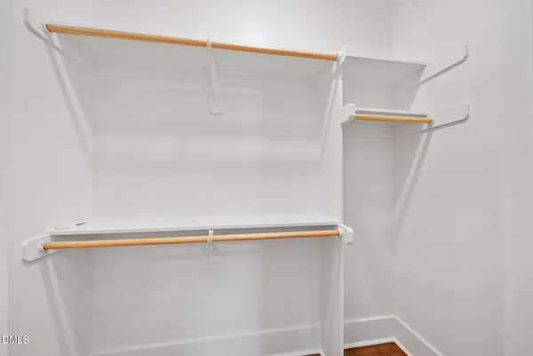 a bathroom with a granite countertop sink a mirror and vanity