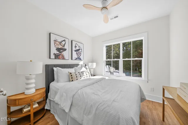 a living room with a couch and a window
