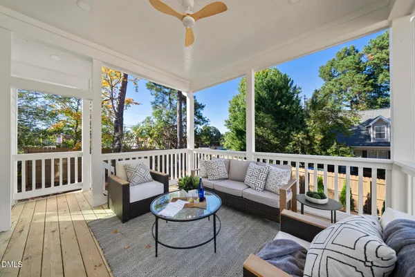 a view of a chairs and table in the patio