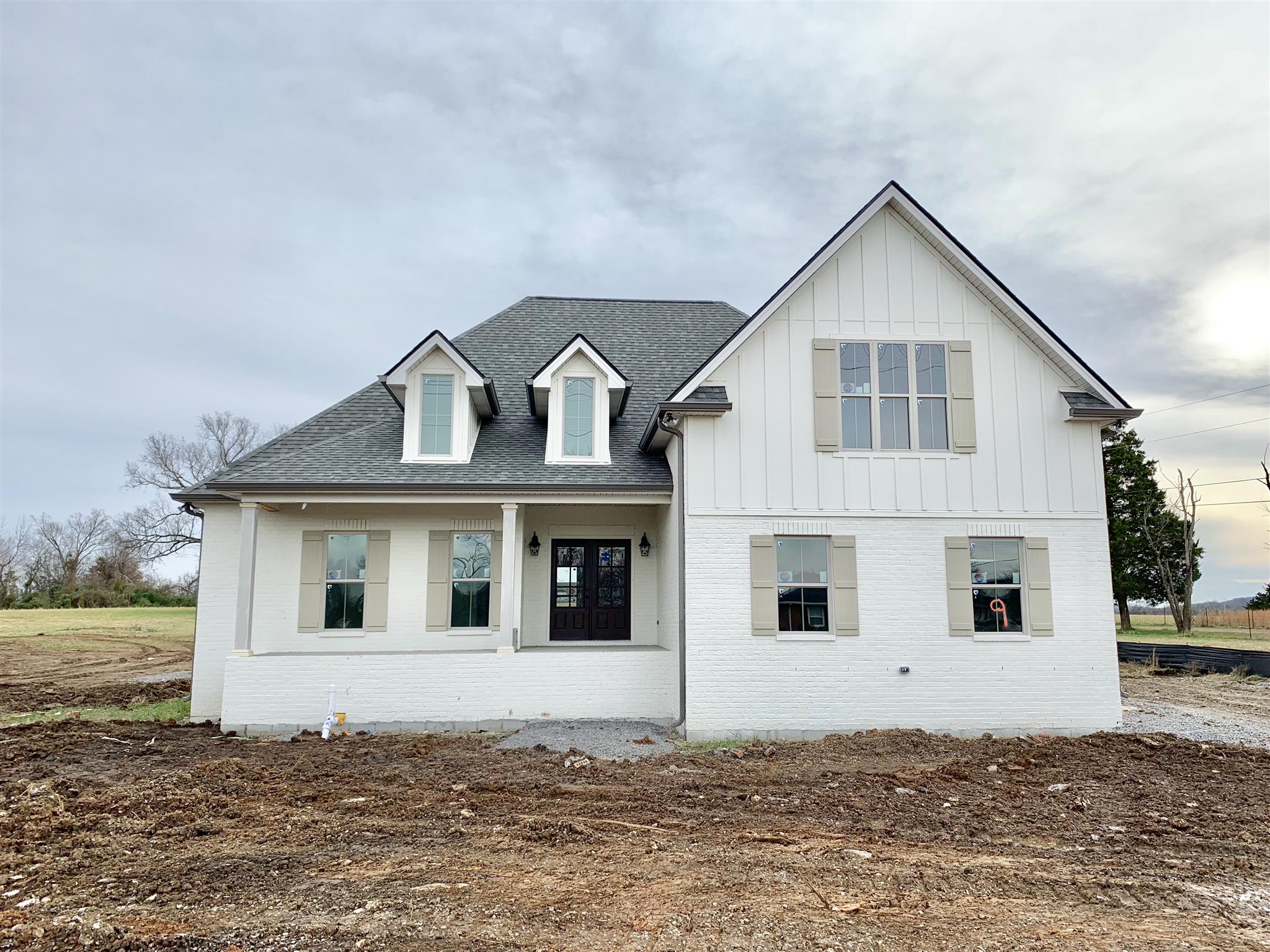 1626 Hickory Ridge Road Lebanon, TN 37087 - Photo 1 of 23 Beautiful white painted brick home with double front doors and covered porch.