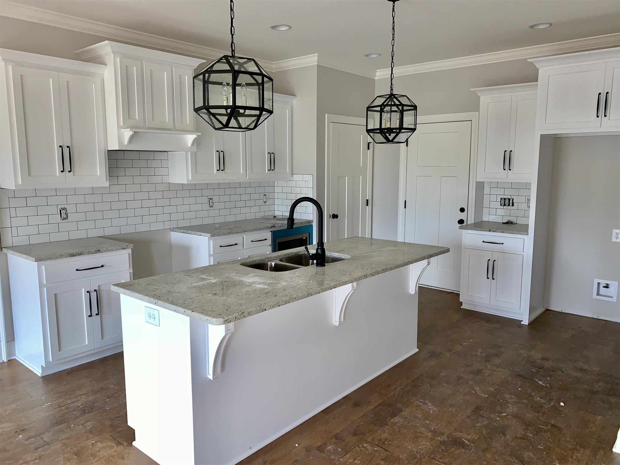 1626 Hickory Ridge Road Lebanon, TN 37087 - Photo 8 of 23 Large kitchen with granite and subway tile back splash.