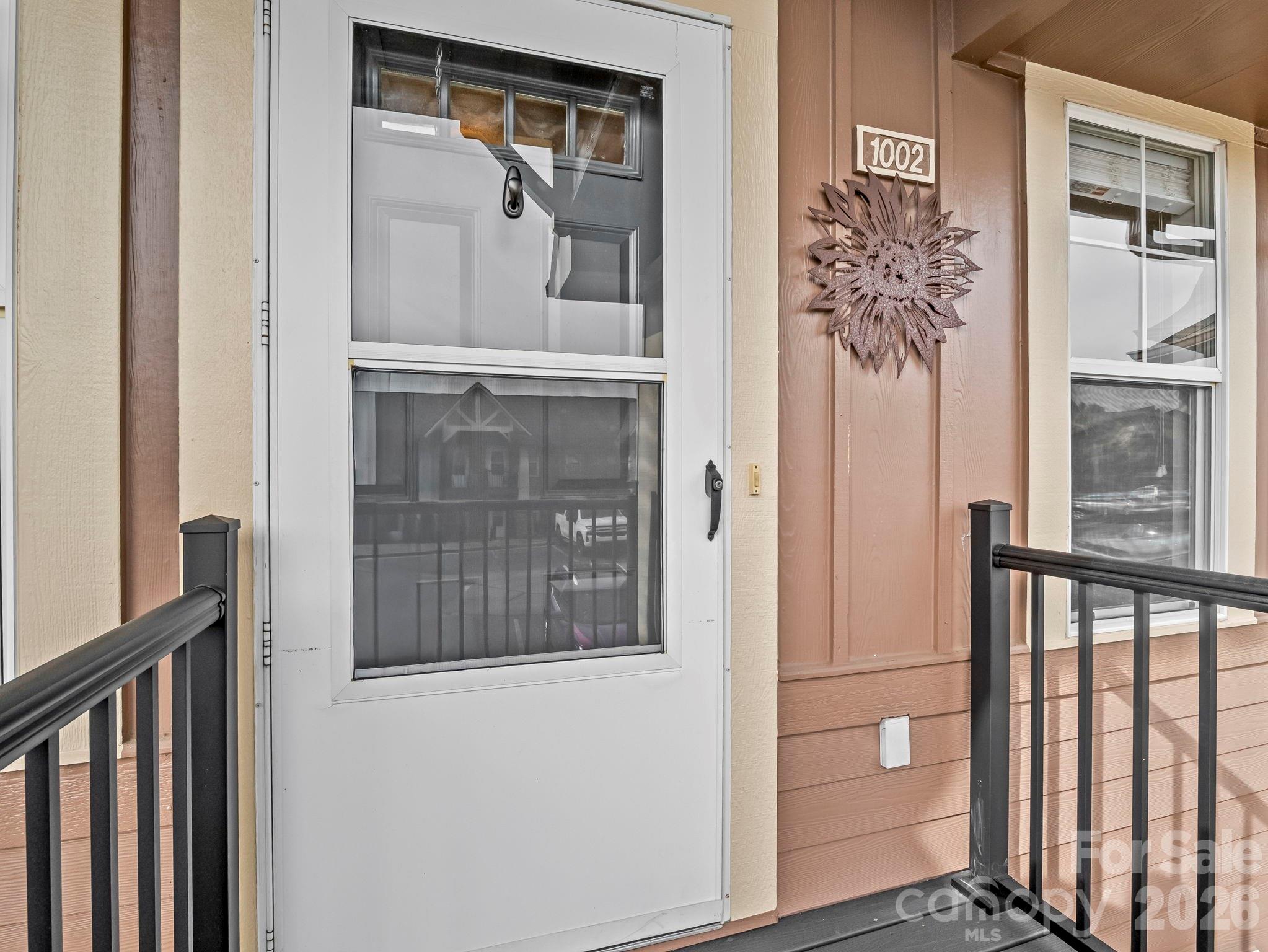1002 Deermouse Way Hendersonville, NC 28792 - Photo 12 of 42 a view of a front door of the house