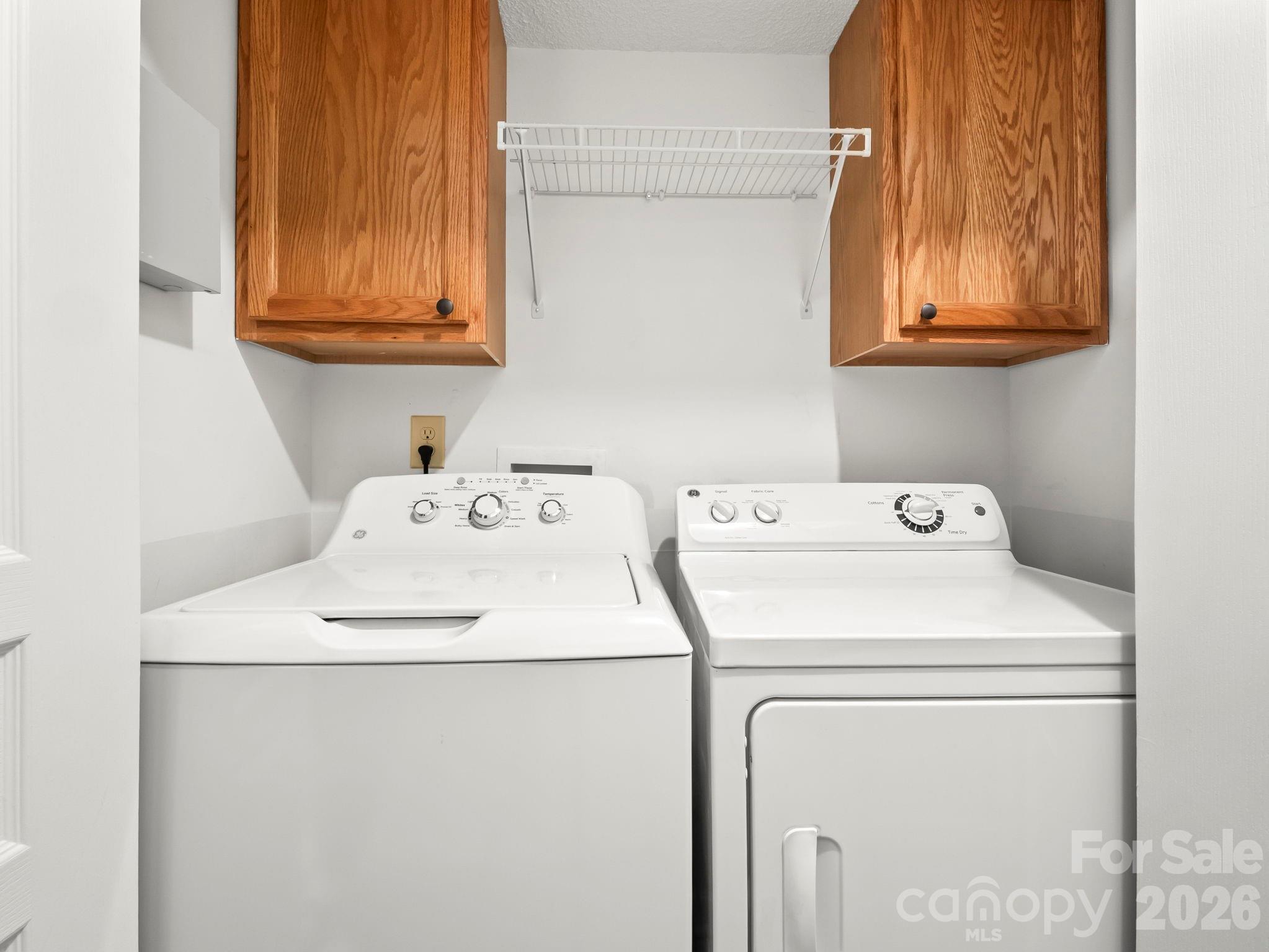 1002 Deermouse Way Hendersonville, NC 28792 - Photo 27 of 42 a utility room with dryer and washer