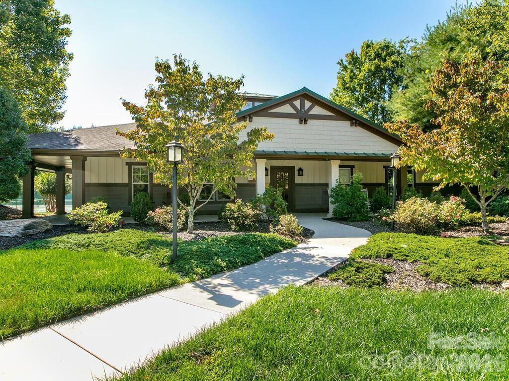 1002 Deermouse Way Hendersonville, NC 28792 - Photo 35 of 42 a front view of a house with garden