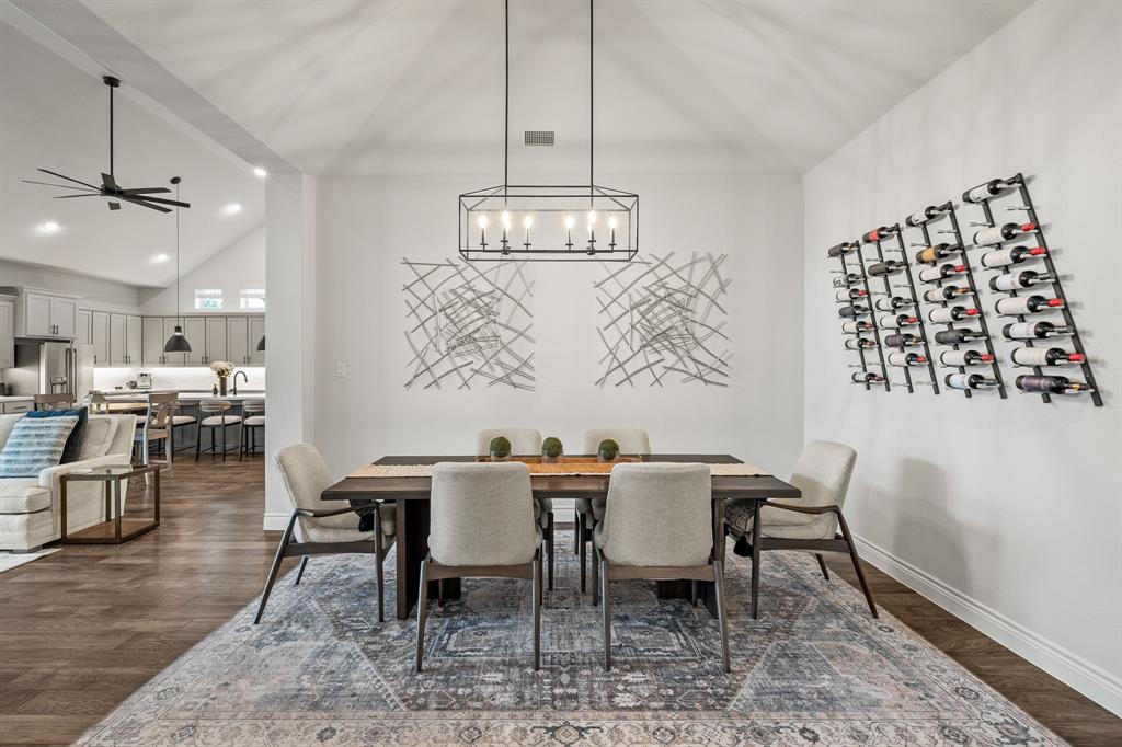 11504 Antler Ridge Way Argyle, TX 76226 - Photo 13 of 40 Dining area is open to the living room and the front hallway. Simply beautiful.