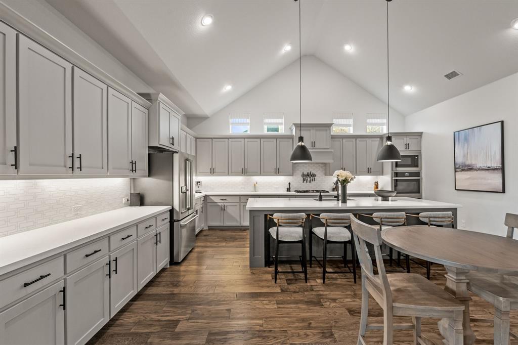11504 Antler Ridge Way Argyle, TX 76226 - Photo 39 of 40 The amount of cabinets in this kitchen floorplan is absolutely amazing. Enough cabinetry for even the highest level cook.