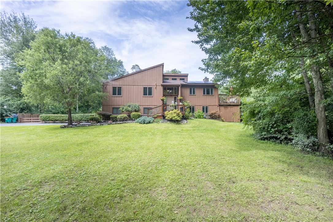 25 Pinebrook Loop Hopewell Junction, NY 12533 - Photo 1 of 1 a view of a house with backyard and garden