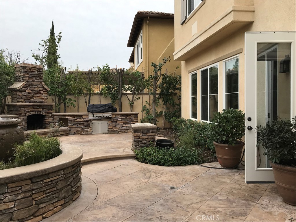 3 Garnet Irvine, CA 92620 - Photo 14 of 15 a view of a patio with couches and potted plants