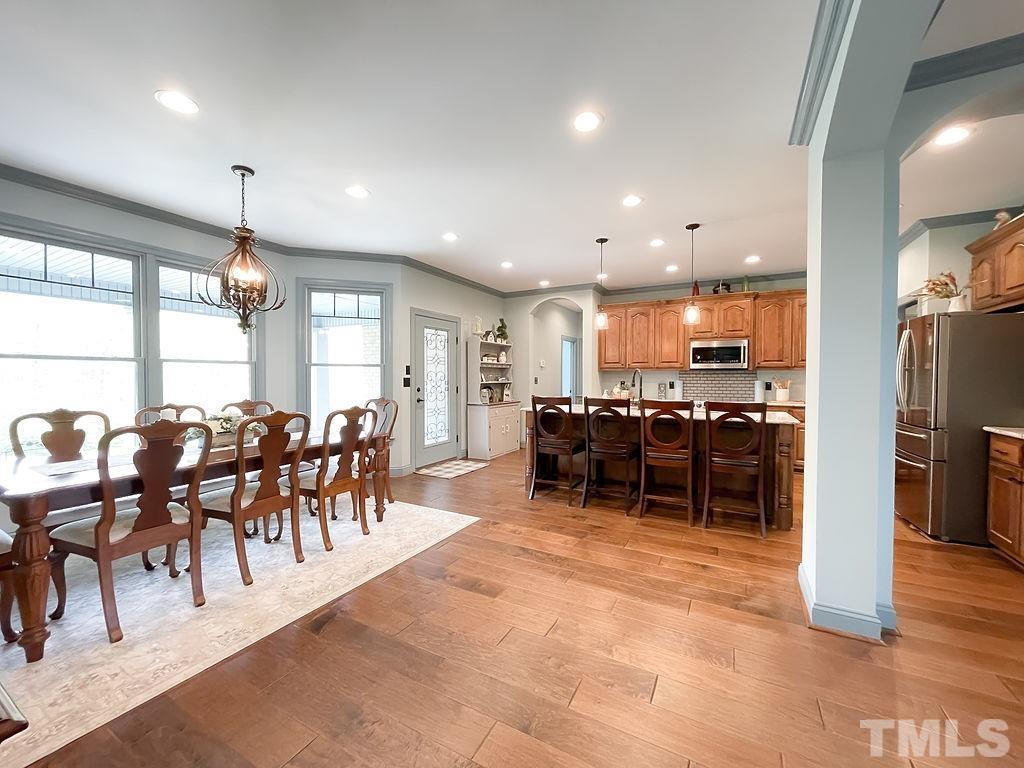 812 Anderson Ridge Road Mebane, NC 27302 - Photo 19 of 45 The dining room is perfect for large crowds or intimate evenings...Private backyard views...
