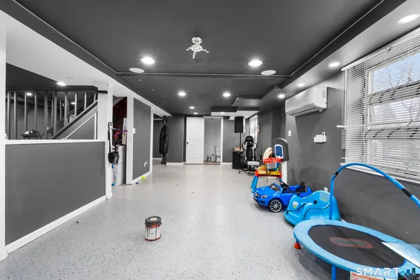 a view of entryway wih livingroom and stairs