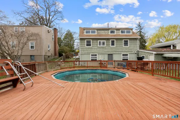a aerial view of a house with a yard