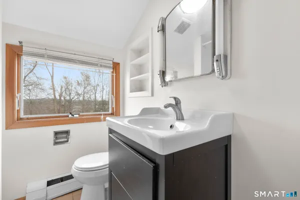a bathroom with a sink and a toilet
