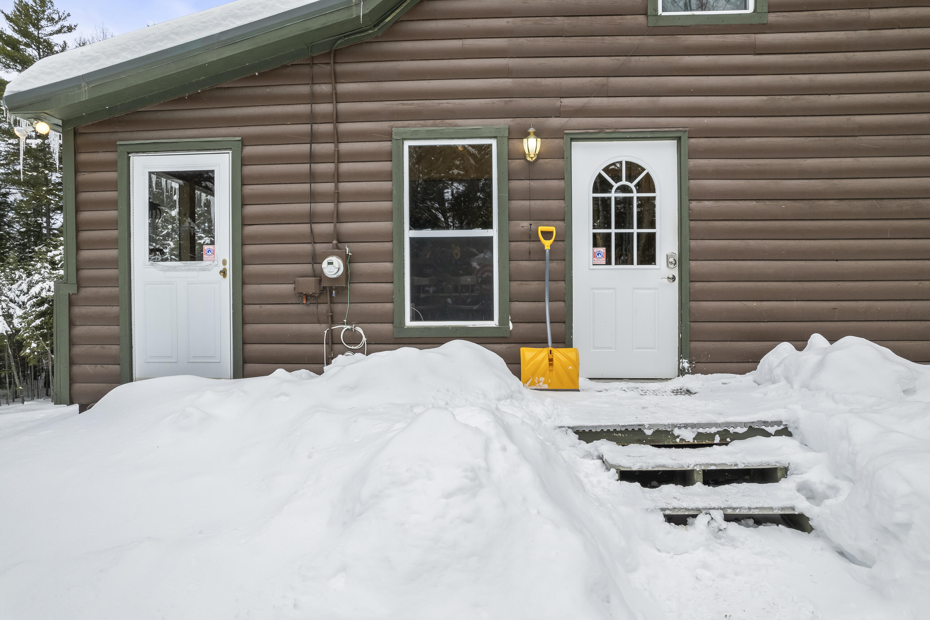 143 Indian Pond Road West Forks, ME 04985 - Photo 6 of 66 Step into the cabin