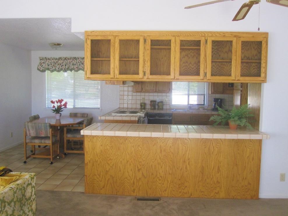 45541 Pittville Road McArthur, CA 96056 - Photo 23 of 26 a dining room with a table and chairs