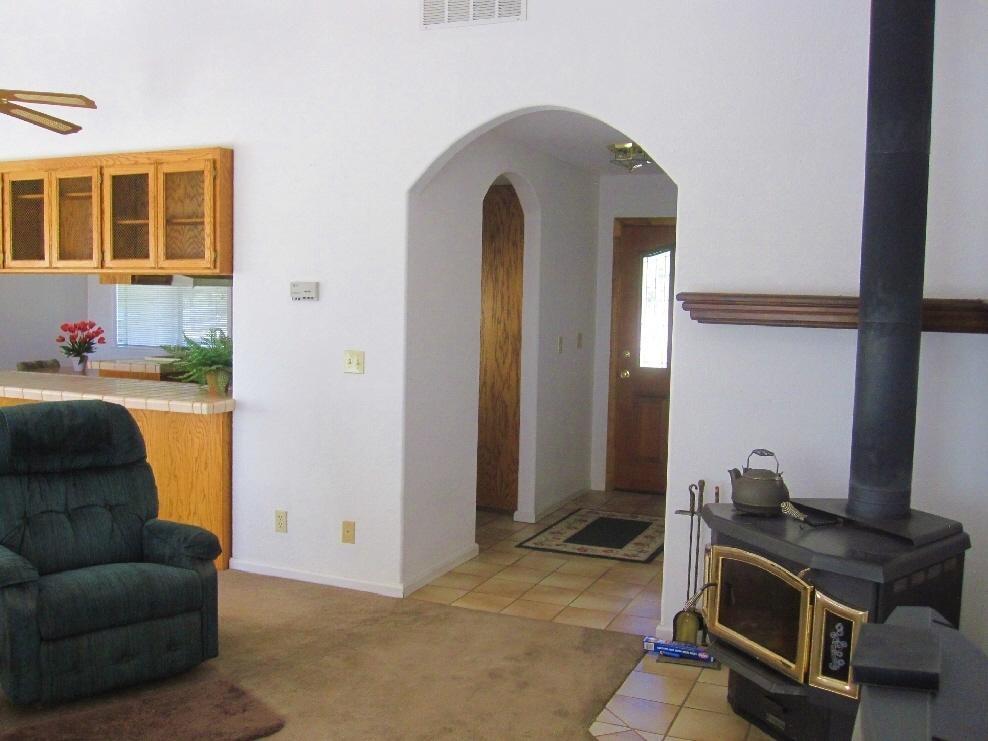 45541 Pittville Road McArthur, CA 96056 - Photo 25 of 26 a living room with furniture and a window