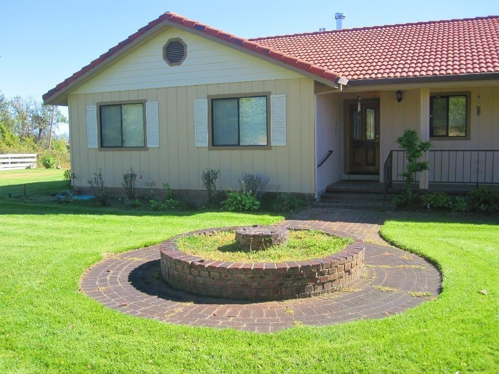 45541 Pittville Road McArthur, CA 96056 - Photo 3 of 26 a view of a house with a backyard