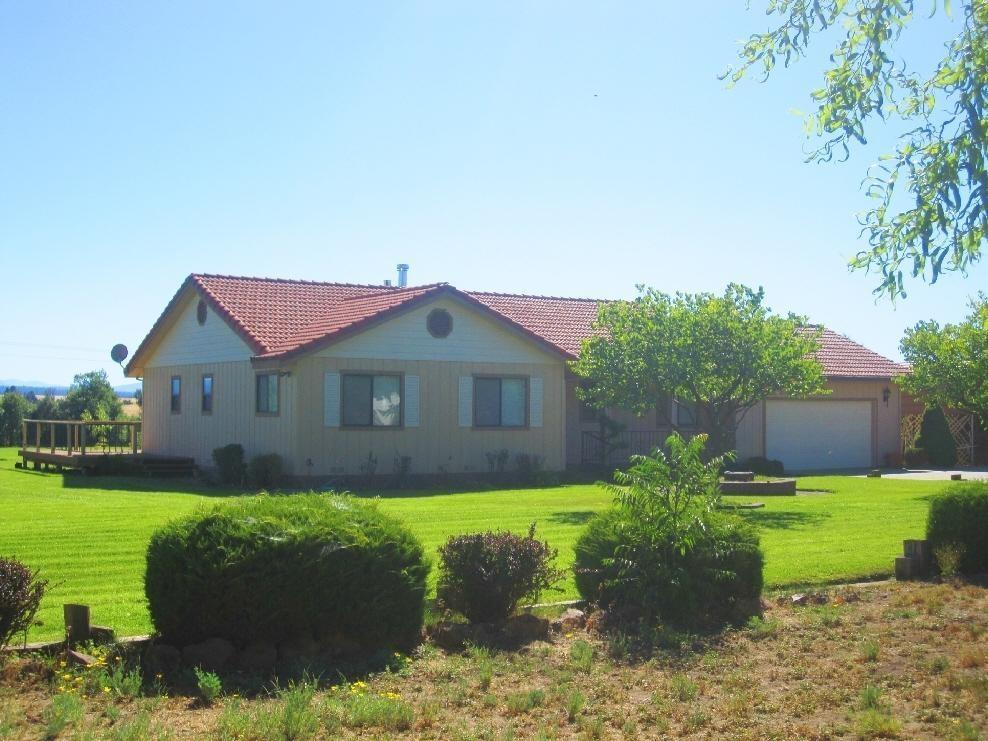 45541 Pittville Road McArthur, CA 96056 - Photo 4 of 26 a house view with a garden