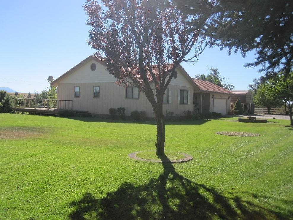45541 Pittville Road McArthur, CA 96056 - Photo 6 of 26 a view of a house with yard and tree s
