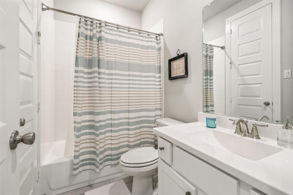 847 Longbranch Way Little Elm, TX 76227 - Photo 20 of 39 Guest bedroom en-suite bathroom