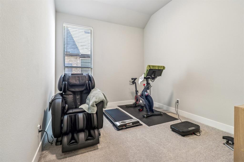 847 Longbranch Way Little Elm, TX 76227 - Photo 21 of 39 This secondary bedroom is being used as a gym.