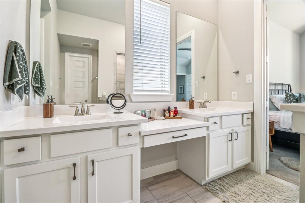 847 Longbranch Way Little Elm, TX 76227 - Photo 28 of 39 Ensuite bathroom featuring double vanity and tile patterned flooring