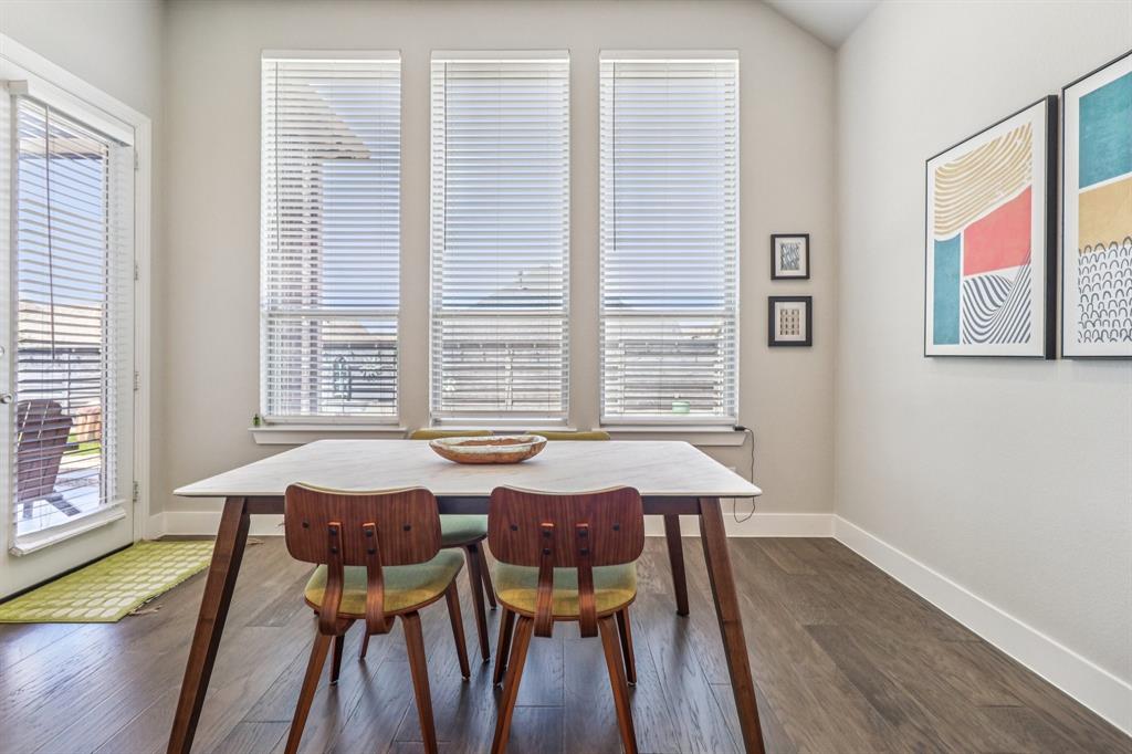 847 Longbranch Way Little Elm, TX 76227 - Photo 7 of 39 Dining room with dark wood-style floors and baseboards