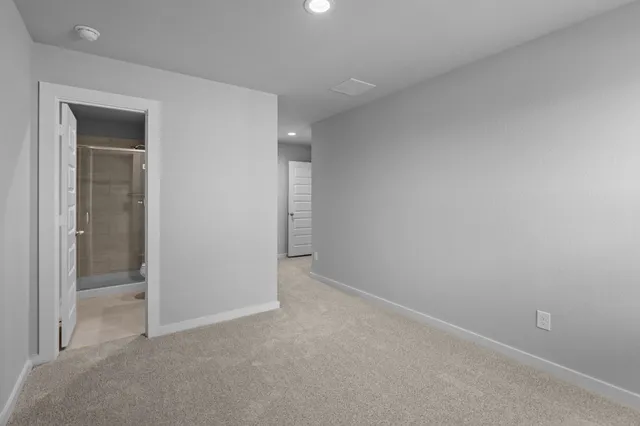 an empty room with sliding door