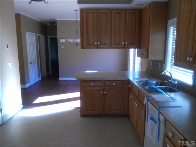 621 Sawmill Road West Cedar Grove, NC 27231 - Photo 2 of 16 Kitchen has plenty of counter and cabinet space and is adjacent to the breakfast area!
