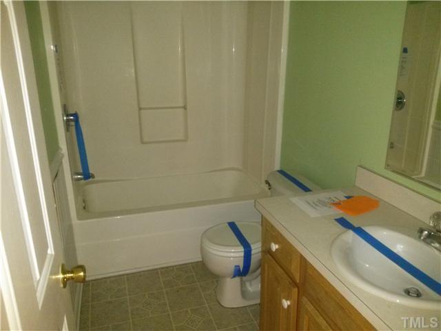 621 Sawmill Road West Cedar Grove, NC 27231 - Photo 8 of 16 Full bathroom downstairs.