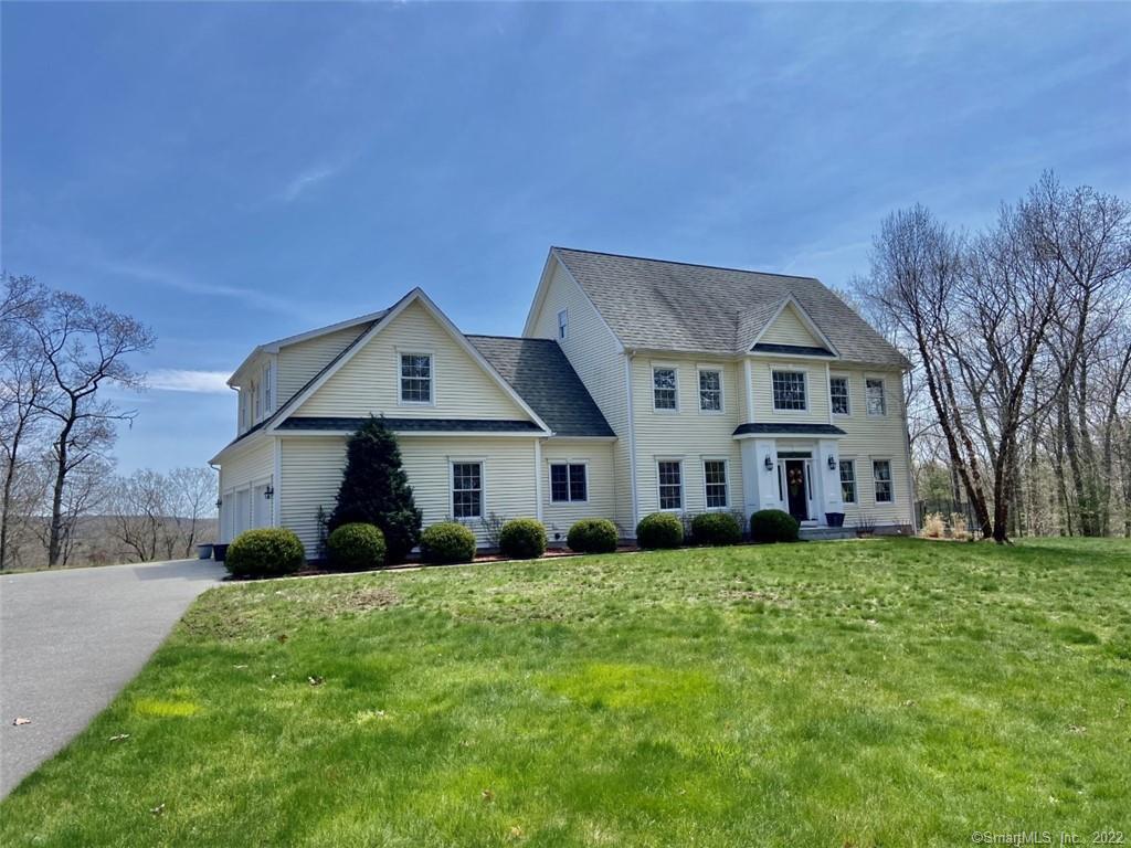 Gorgeous Colonial with 3 Car Attached Garage on Almost 12 Acres!
