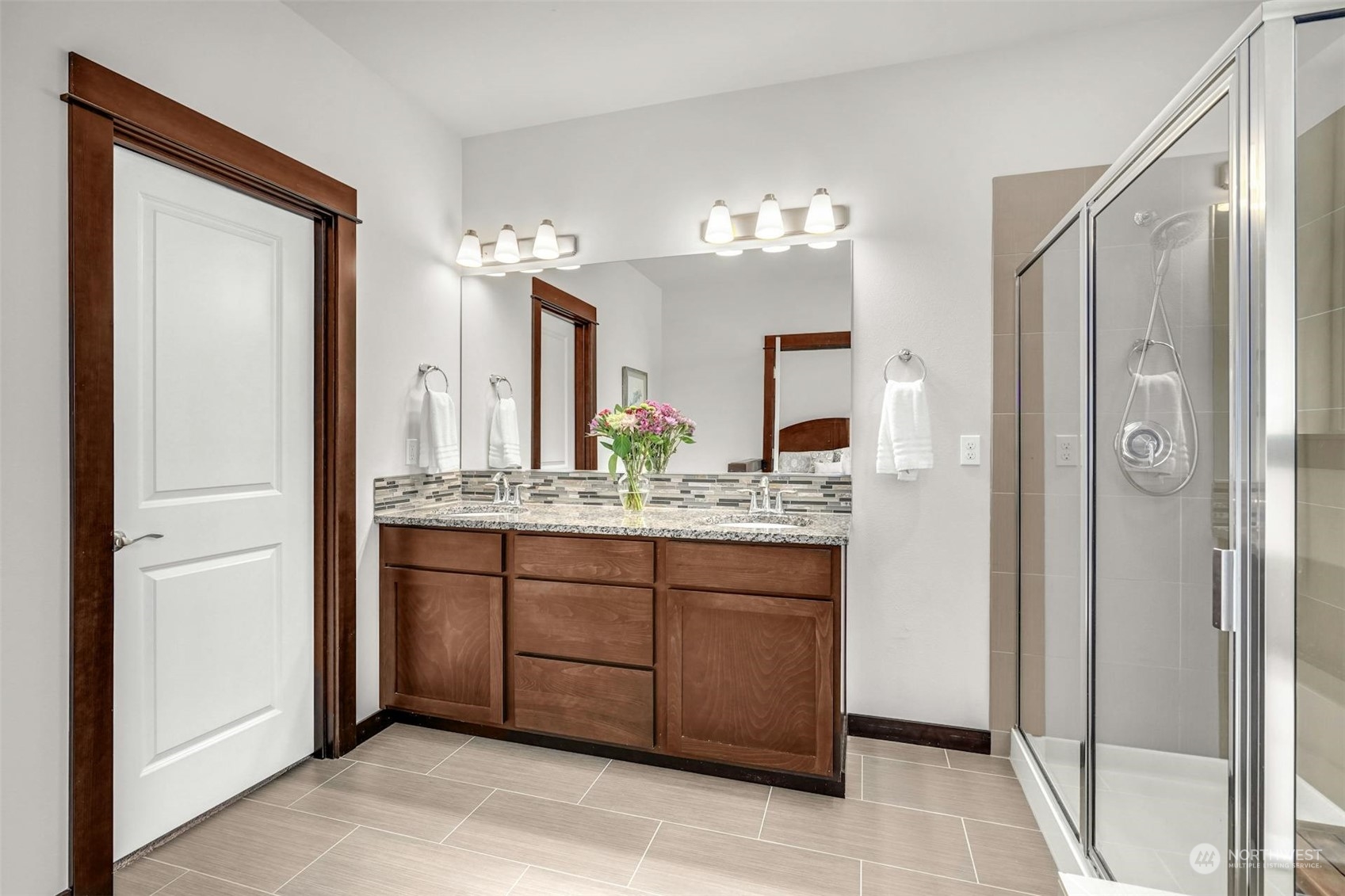 17801 3rd Avenue Southeast Bothell, WA 98012 - Photo 20 of 40 a bathroom with a granite countertop sink and a mirror