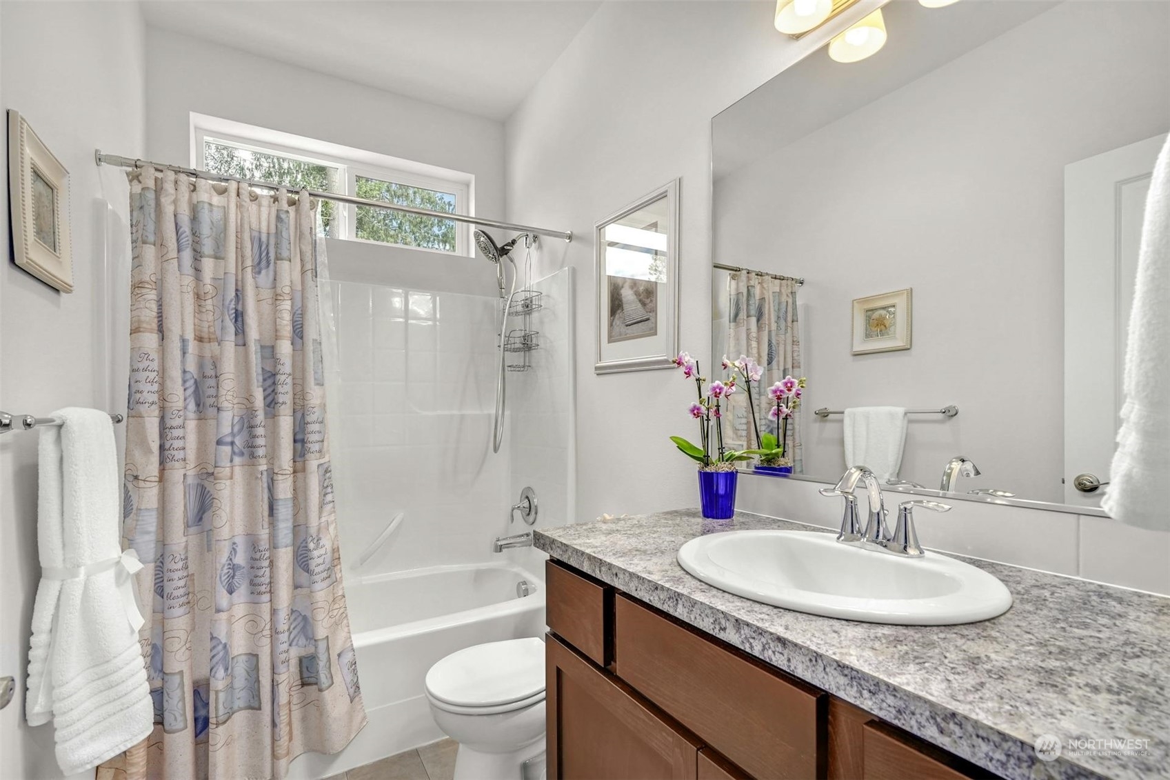 17801 3rd Avenue Southeast Bothell, WA 98012 - Photo 25 of 40 a bathroom with a granite countertop sink toilet and shower