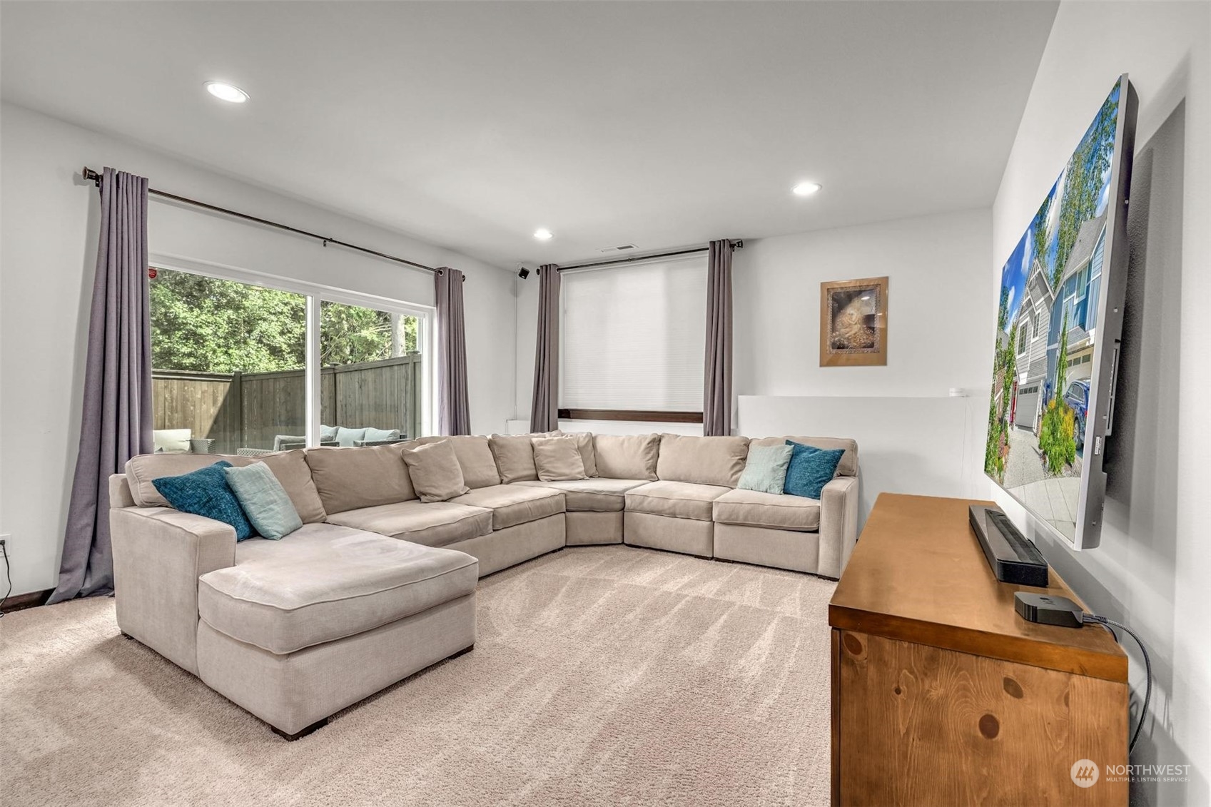 17801 3rd Avenue Southeast Bothell, WA 98012 - Photo 28 of 40 a living room with furniture and a flat screen tv