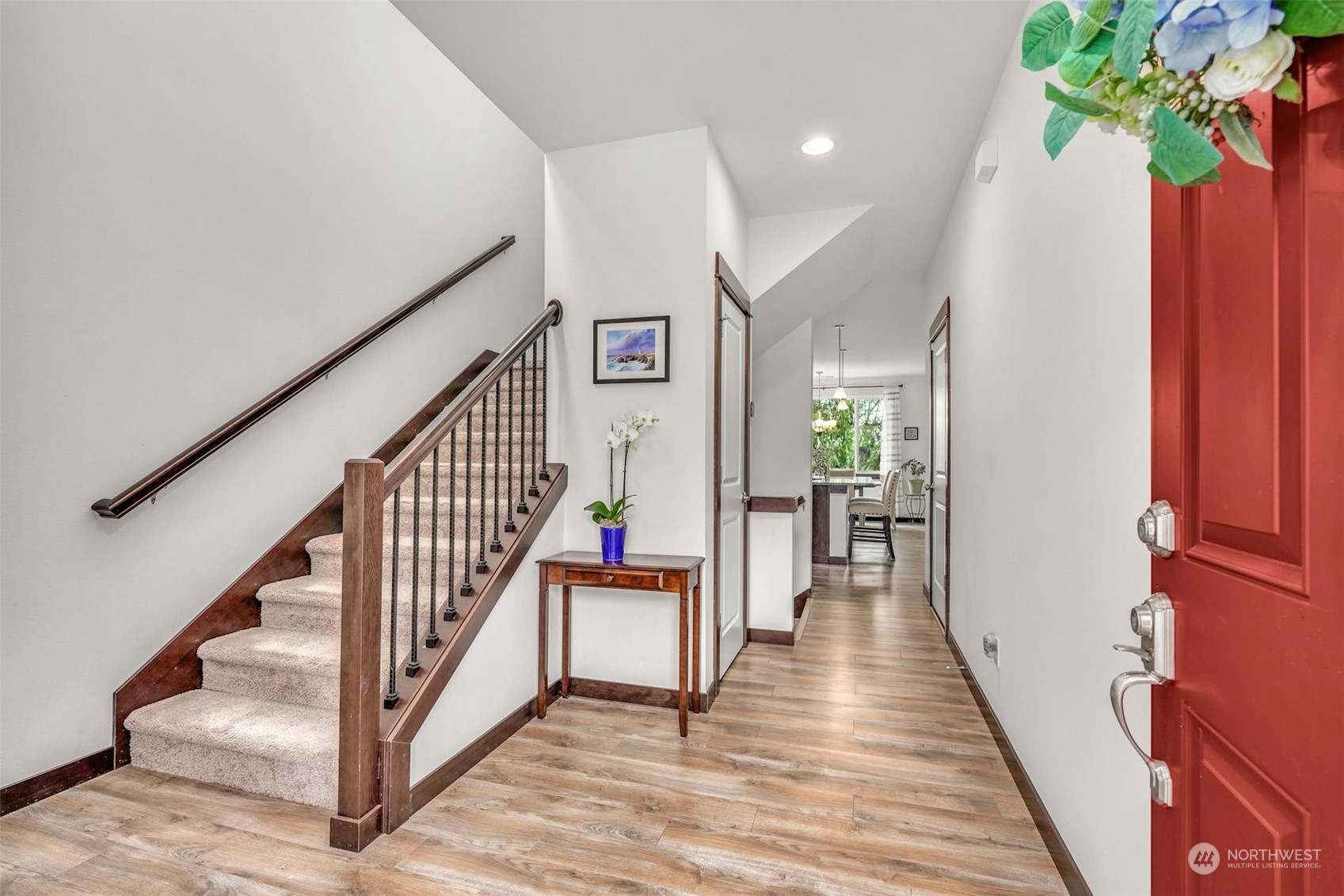 17801 3rd Avenue Southeast Bothell, WA 98012 - Photo 4 of 40 a view of a hallway with wooden floor and staircase
