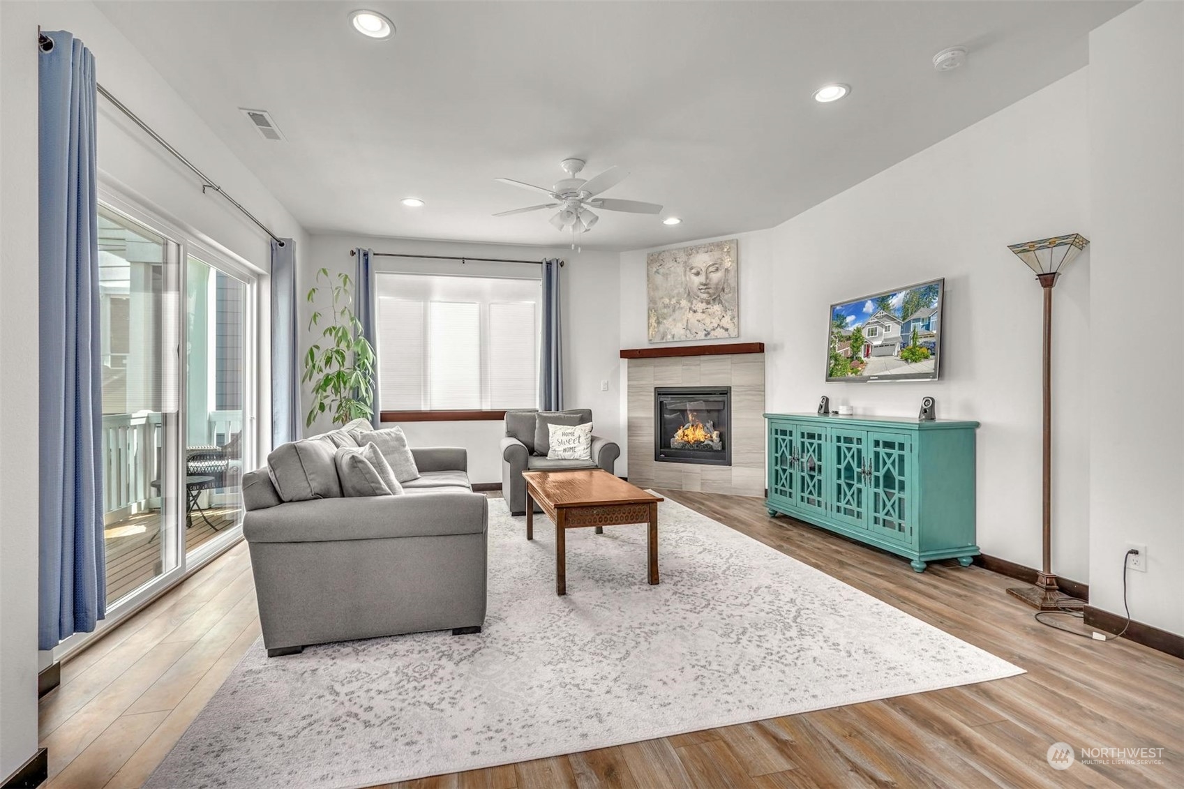 17801 3rd Avenue Southeast Bothell, WA 98012 - Photo 5 of 40 a living room with furniture and a fireplace