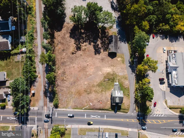 a picture of a building with a bench