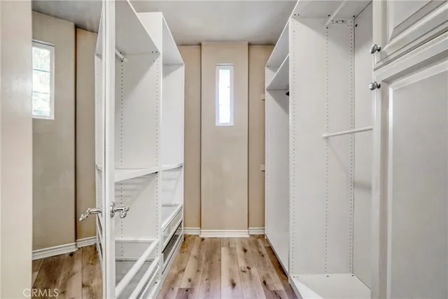 a view of a bathroom from a hallway