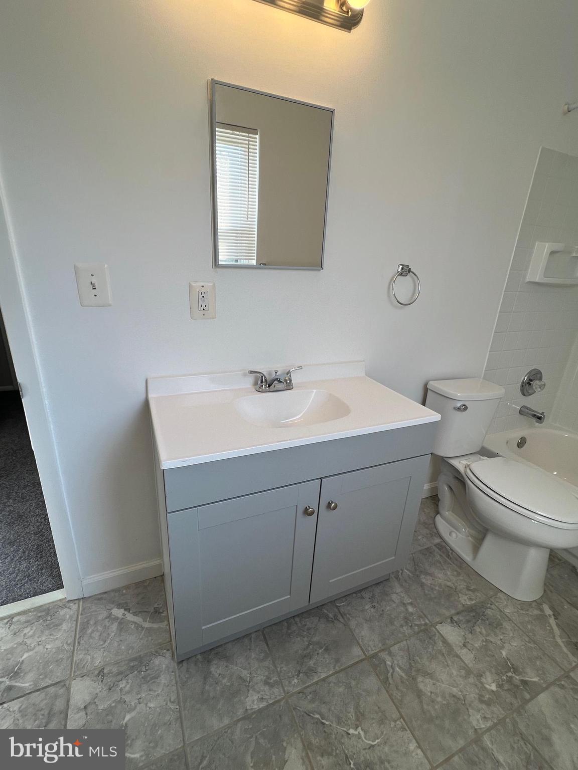 55 Noble Road Sicklerville, NJ 08081 - Photo 13 of 22 a bathroom with a sink toilet and mirror
