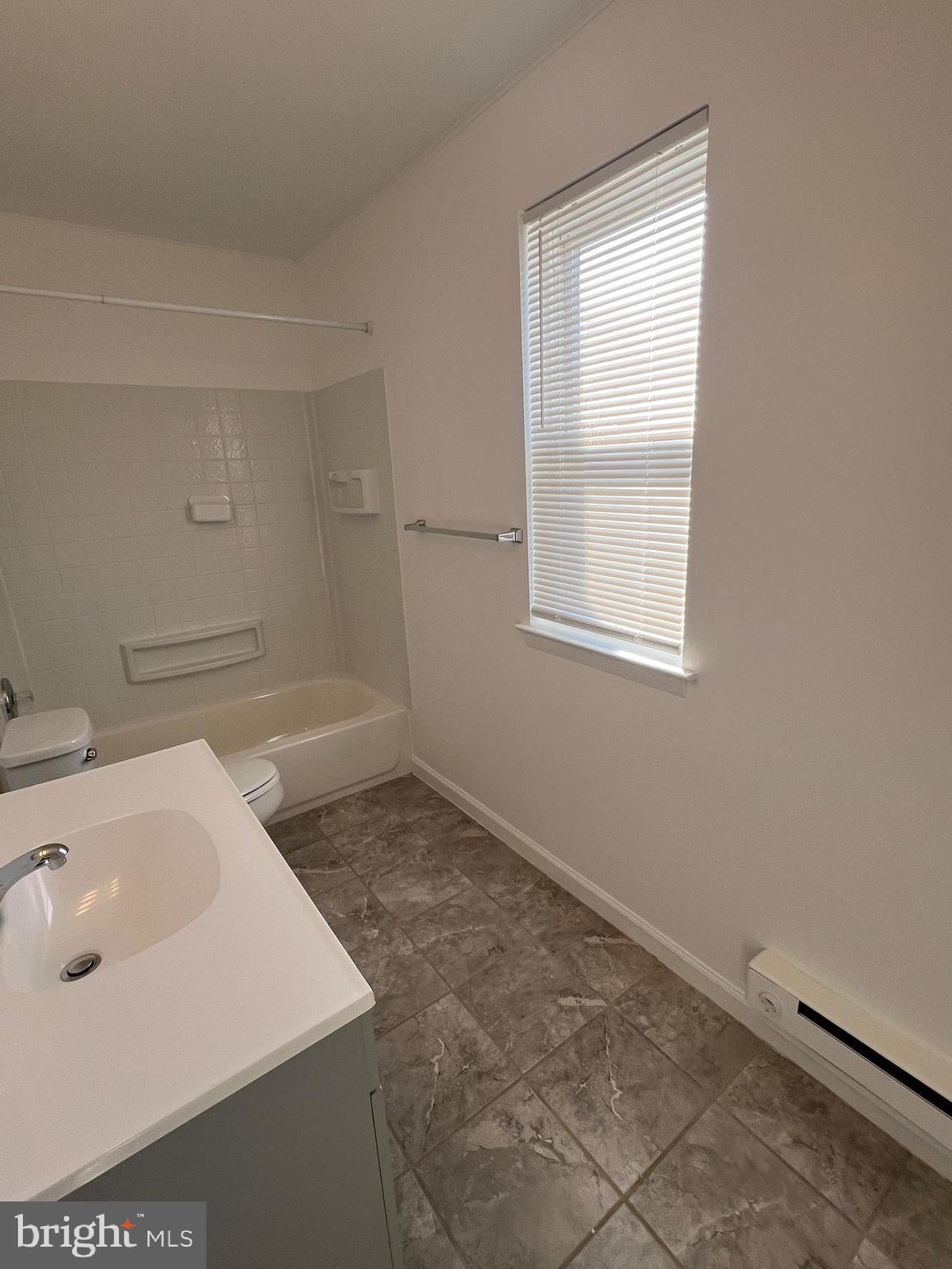 55 Noble Road Sicklerville, NJ 08081 - Photo 14 of 22 a bathroom with a sink toilet and tub