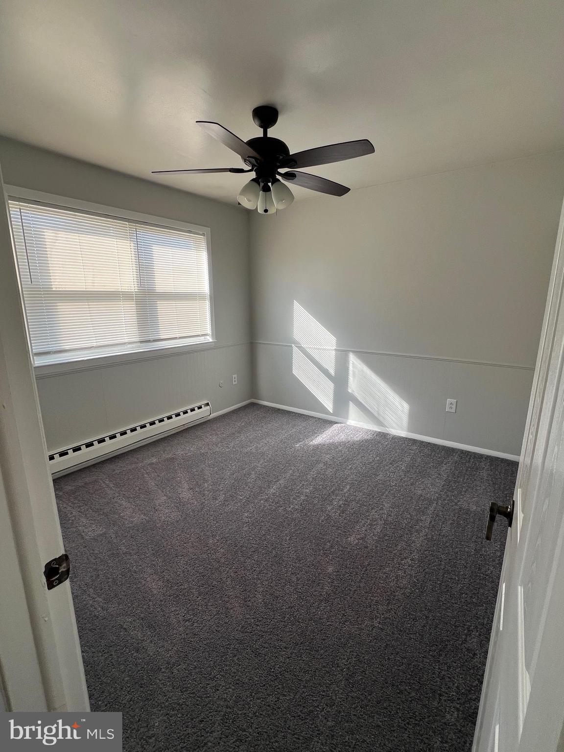 55 Noble Road Sicklerville, NJ 08081 - Photo 5 of 22 a view of a room with window and a ceiling fan
