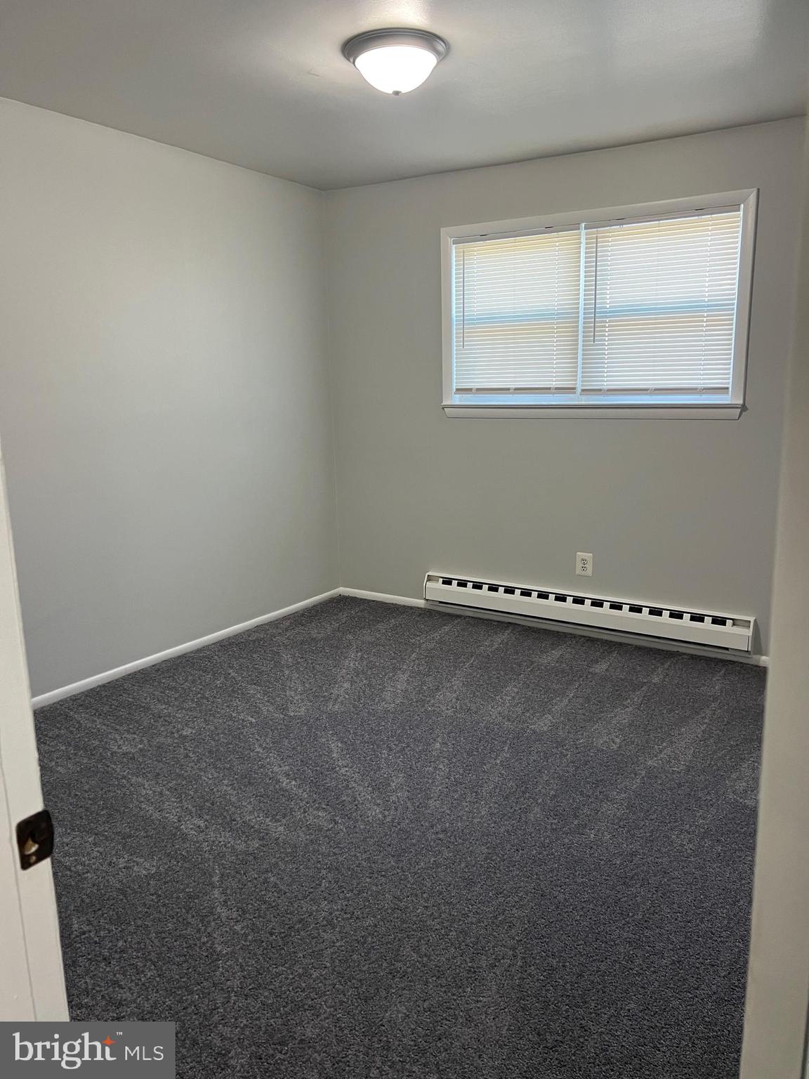 55 Noble Road Sicklerville, NJ 08081 - Photo 10 of 22 an empty room with a window