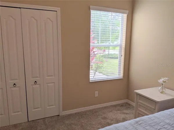 a view of a room that has a window in it
