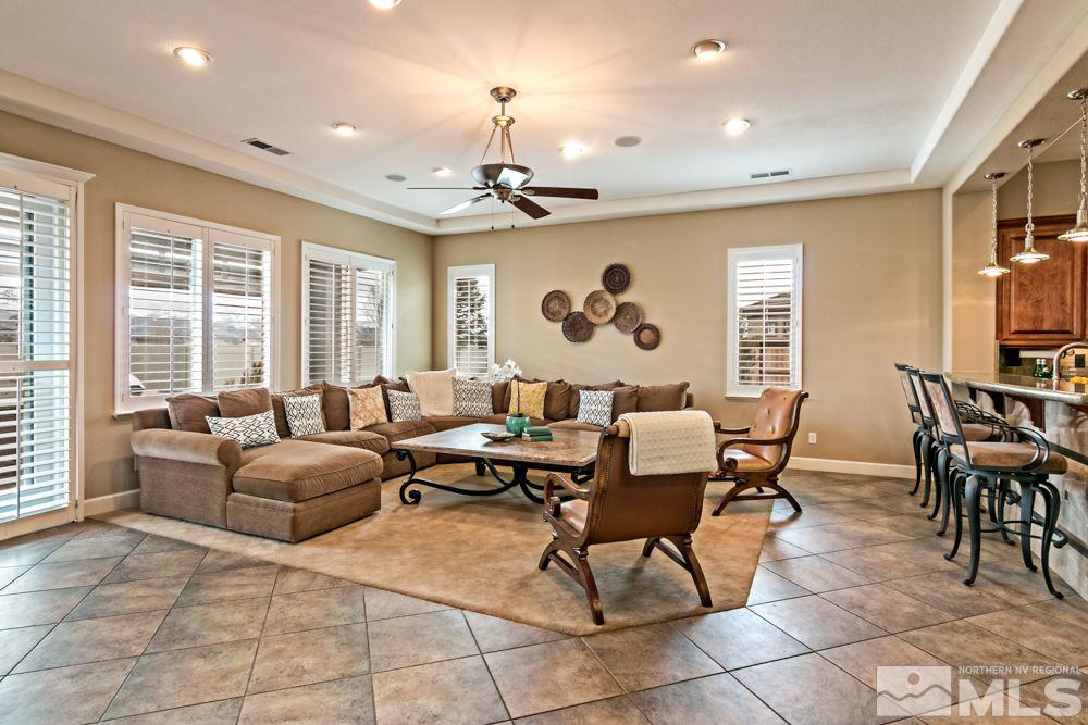 10125 Burghley Lane Reno, NV 89521 - Photo 3 of 13 a living room with patio furniture and a window